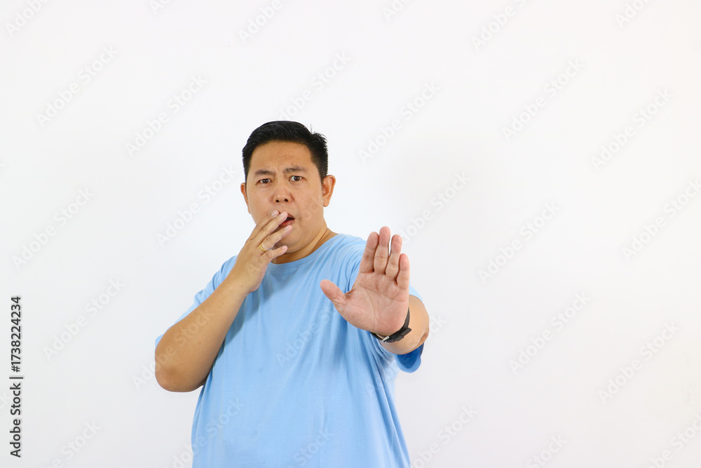 Fototapeta premium Man Expressing Stop Gesture with Surprised Face