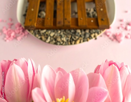 Pink tulips and wooden slats on a tray
