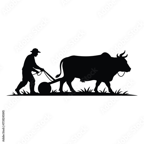 Silhouette of a farmer plowing a field with an ox animal