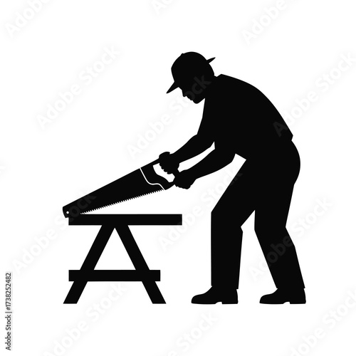 Silhouette of a carpenter sawing wood on a sawhorse