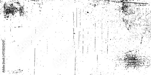 Abstract grunge background with water drops on a dirty glass surface displaying an old texture and black dust pattern