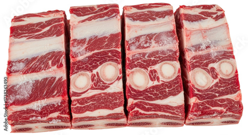 Isolated short ribs on a plain surface offering a rich flavor when cooked over low heat