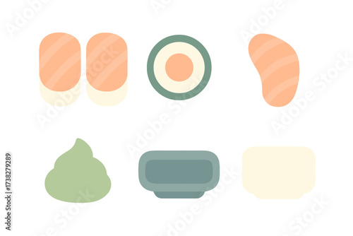 Assortment of Japanese sushi, sashimi, wasabi, and soy sauce dishes on white