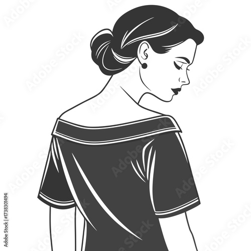 Elegant woman in a dress with a bun hairstyle
