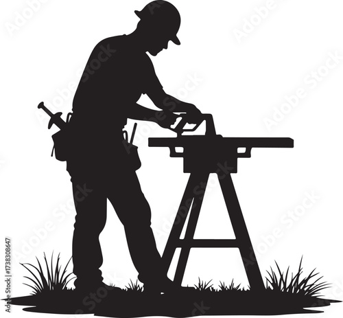 Silhouette of a carpenter using a table saw outdoors