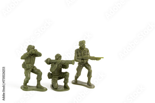 Mini Green Toy Soldiers on white background.