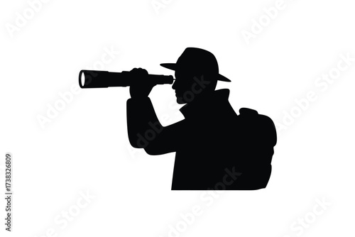 Silhouette of a person with a hat looking through a telescope