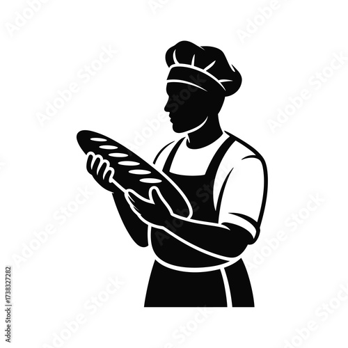 Silhouette of a baker holding a freshly baked loaf of bread