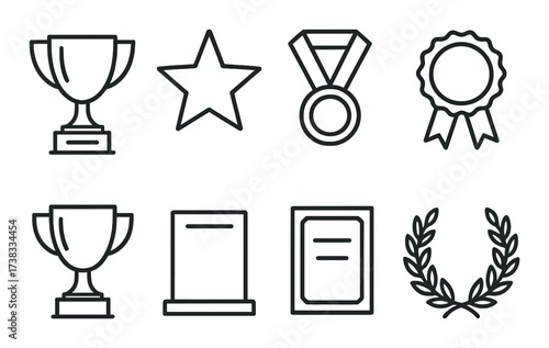 Award symbols: trophies, medals, badges, plaques, and laurels on wooden background