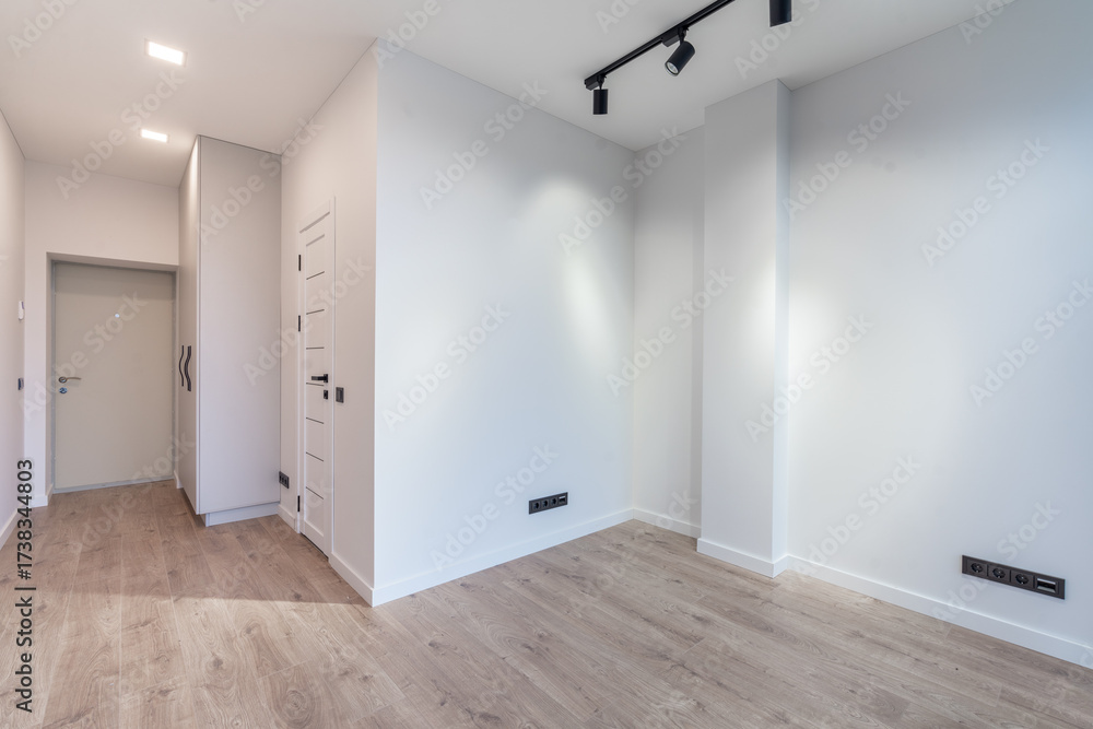 Obraz premium Modern Minimalist Empty Room Interior with Wooden Floor and White Walls. 