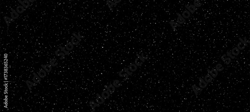 Dark cosmic space background with many tiny white stars for astronomy, science, nature, and starry night sky concepts.