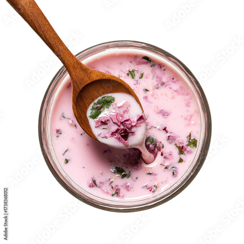 authentic maharashtrian sol kadhi with wooden spoon close up
