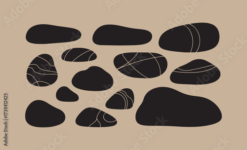 Collection of smooth dark polished stones with subtle white veining