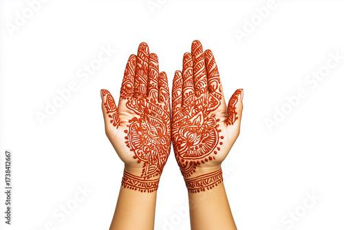 Close up view of a women hand with mehandi isolated in white background