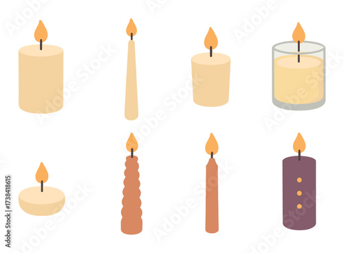 Variety of illuminated candles with different shapes and colors
