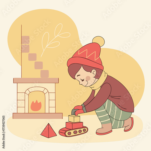 A young child wearing a red hat and scarf plays with building blocks and toys near a warm fireplace indoors