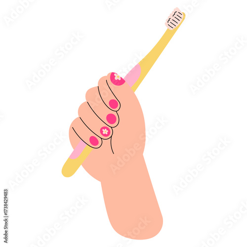 Kids hand holding a yellow toothbrush with pink details. Daily dental care and oral hygiene. Perfect for healthcare, dentistry, and lifestyle concepts.
