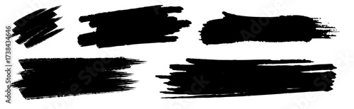 Abstract distressed black paint strokes set creating a versatile design element on a clean white