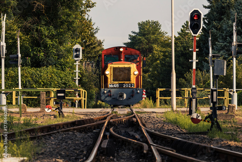 Close-up view of vintage train at railway crossing
