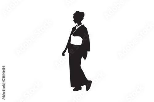 Silhouette of a woman in a traditional kimono