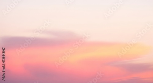 Soft pastel sky with gentle clouds at sunset, creating a peaceful and dreamy atmosphere a beautiful background for your creative projects