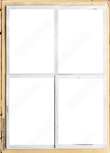 A vintage book page with blank photo frames