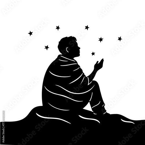 Silhouette of a person wrapped in a blanket looking at stars  