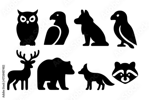 Wildlife Icon Grid. Solid, filled icon set of watcher in nature: owl, eagle, wolf, hawk, deer, bear, fox, raccoon. Solid, filled icons in only black color. All