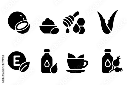 Natural Lip Care Icons. Solid, filled icon set of natural lip care: coconut oil, shea butter, honey, aloe vera, vitamin E, jojoba oil, green tea, rosehip oil.