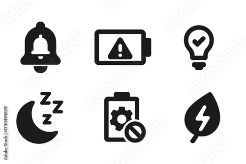 System Notification Icons Set. Solid, filled icon set of system notifications: power alert, low battery warning, power saving mode activated,