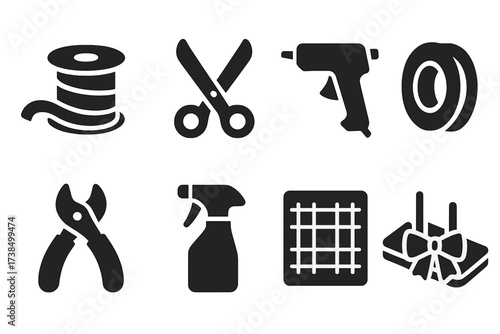 Ribbon Crafting Icons. Solid, filled icon set of ribbon crafting tools: ribbon spool, scissors, hot glue gun, tape roll, ribbon cutter, fabric stiffener, craft