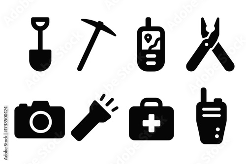 Expedition Tools Icons. Solid, filled icon set of expedition tools: shovel, pickaxe, GPS device, multi-tool, camera, torch, first aid kit, walkie-talkie.