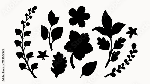 Black silhouettes of various flowers leaves and stems arranged on a white background in a decorative fashion
