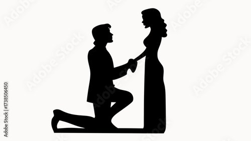 Silhouette of a man proposing to a woman in a long dress holding hands in black and white image