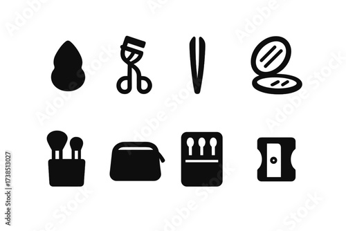 Travel Makeup Icons. Solid, filled icon set of travel size makeup tools: mini makeup sponge, small eyelash curler, travel tweezers, tiny mirror, compact brush