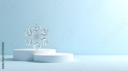 A stunning crystal snowflake displayed on white podiums, evoking a serene winter ambiance.