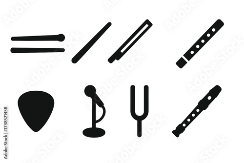 Musical Instrument Icons. Solid, filled icon set of stick musical instruments: drumstick, conductor baton, violin bow, flute, guitar pick, microphone stand,