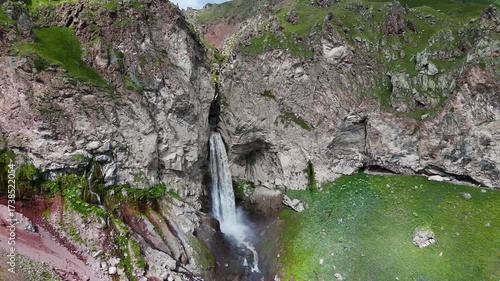 Flying over the Jily-Su Waterfall in the Caucasus in the summer