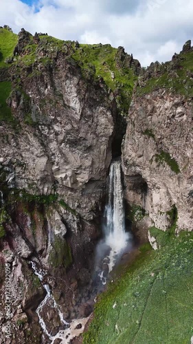 Flying over the Jily-Su Waterfall in the Caucasus in the summer