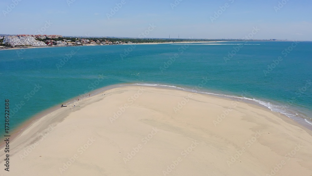 Fototapeta premium Aerial view of the beautiful beaches and marinas of El Rompido in the province of Huelva, Andalusia, Spain.