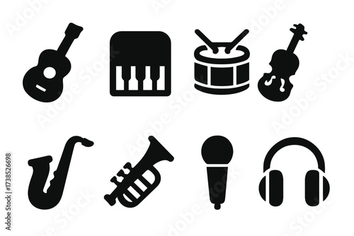 Musical Icons Collection. Solid, filled icon set of musical instruments: guitar, piano, drum, violin, saxophone, trumpet, microphone, headphones. Solid, filled