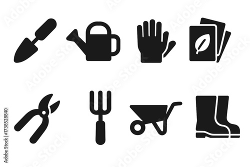 Gardening Tools Icons. Solid, filled icon set of gardening tools: trowel, watering can, gloves, seed packets, pruning shears, garden fork, wheelbarrow, garden