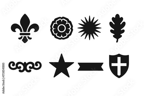 Decorative Crest Icons. Solid, filled icon set of decorative crests: fleur-de-lis, rose, sunburst, oak leaf, scrollwork, star, ribbon, shield with cross.