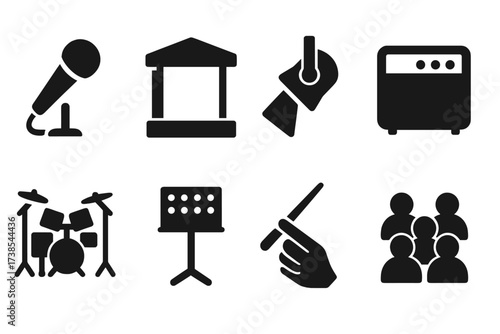 Music Performance Icons. Solid, filled icon set of music performance: microphone, stage, spotlight, guitar amplifier, drum set, music stand, conductor baton,
