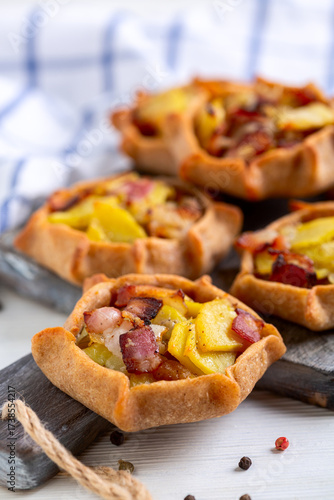 Traditional open pies (kalitki) close up.