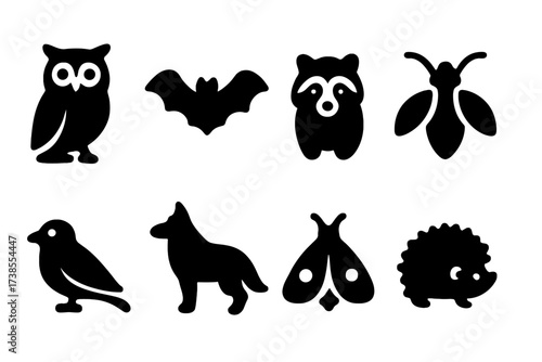 Nocturnal Animal Icons. Solid, filled icon set of nocturnal animals: owl, bat, raccoon, firefly, nightjar, wolf, moth, hedgehog. Solid, filled icons in only