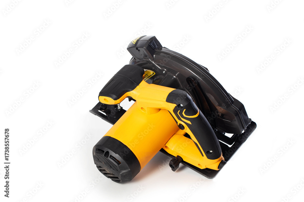 Fototapeta premium A powerful electric hand-held circular saw isolated on a white background, close-up. Woodworking tool.