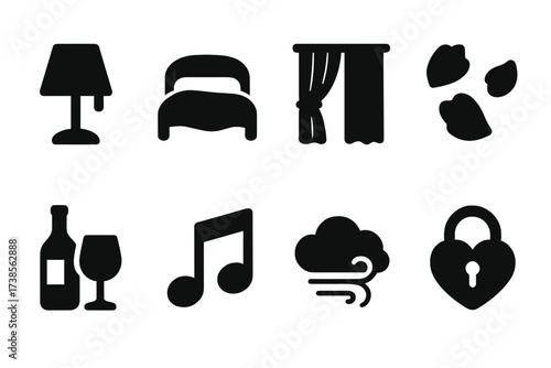 Intimate Icon Set. Solid, filled icon set of intimate ambiance: dim lamp, satin bed, drawn curtain, rose petals, wine bottle, slow music note, night breeze,