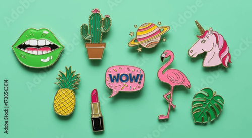 A Collection Of Whimsical Enamel Pins Featuring A Pineapple A Cactus A Flamingo A Unicorn A Planet A Green Leaf A Pair Of Lips And A Lipstick With The Word Wow Spoken In A Speech Bubble