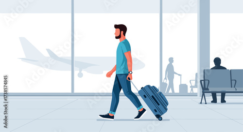 Man walking with suitcase in modern airport terminal